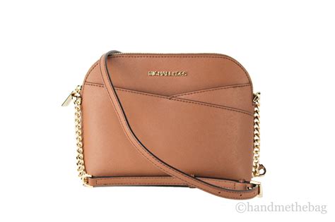 michael kors jet set travel pale gold dome crossbody